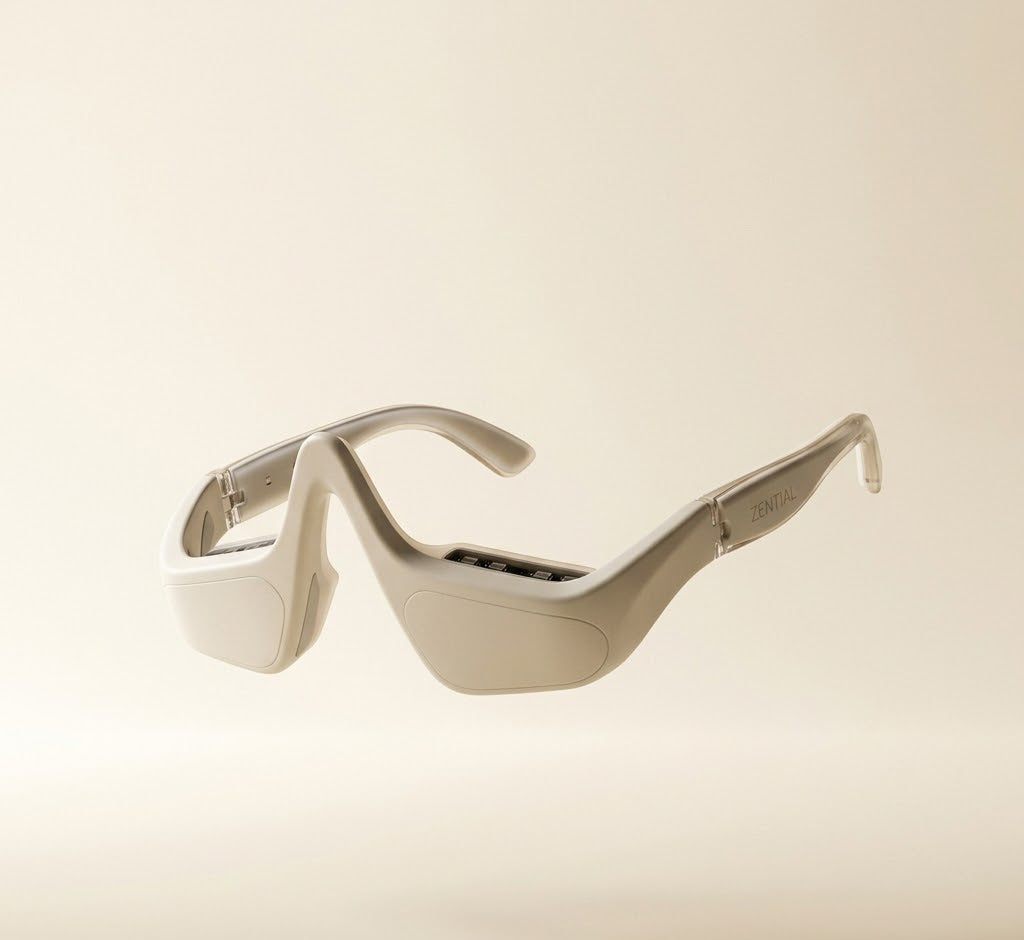 Sunglasses with a metallic finish on a beige background