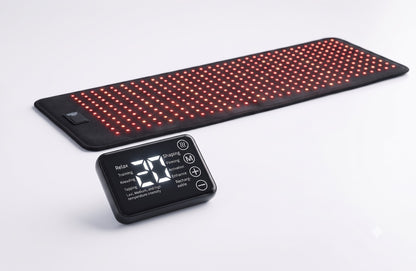 The Restoration Mat with handheld remote control, unrolled